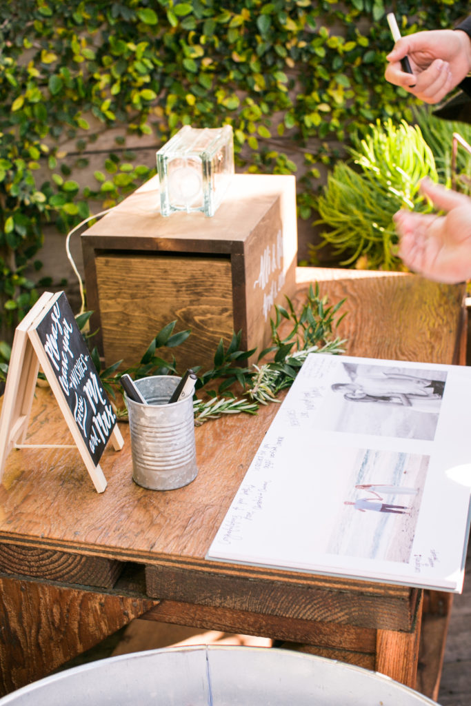 card box and guest book with plants