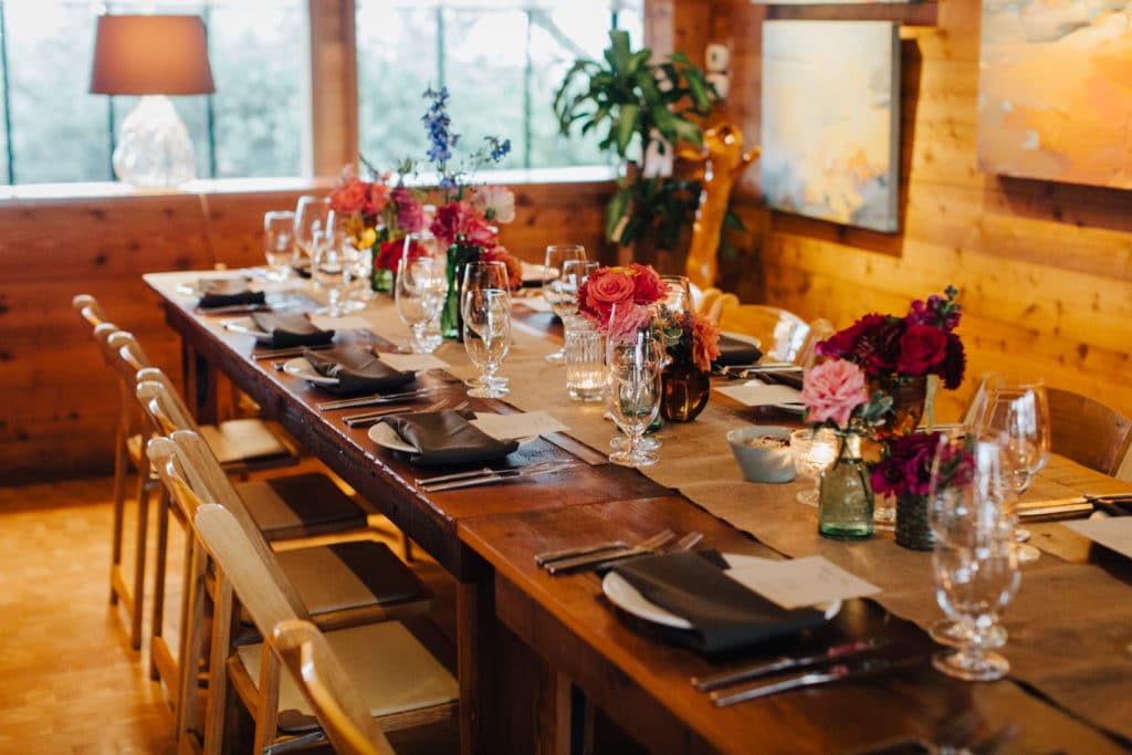 Ventana Inn long wooden tables wedding reception