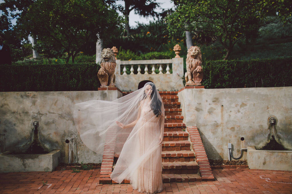 Bridal shoot with a full length veil at the Virginia Robinson wedding in Beverly Hills