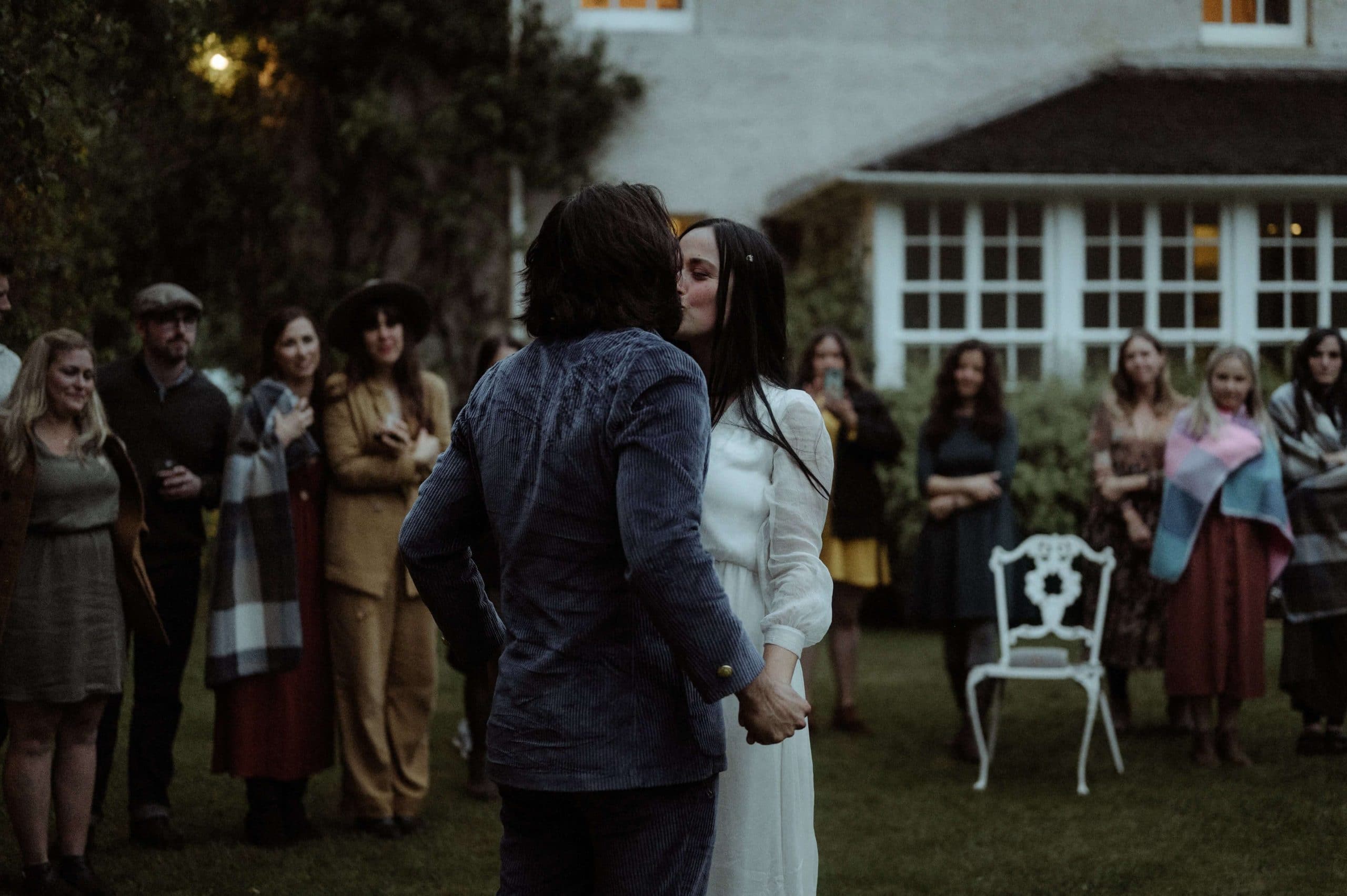 Bride and groom first dance in forest at Inshriach House in Scotland